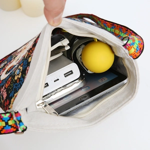 Ethnic style embroidered canvas crossbody bag with large capacity and zipper closure