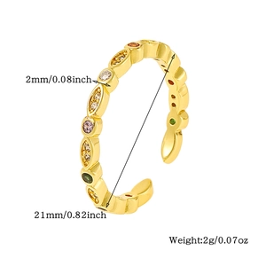 Detail shot showing 2mm thickness and 21mm diameter of gold ring with zircon