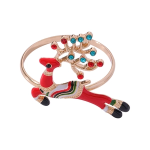 Golden Christmas reindeer napkin ring with red enamel and sparkling colored rhinestones
