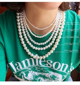 Comparison of various pearl sizes from 4mm to 12mm on long layering necklaces