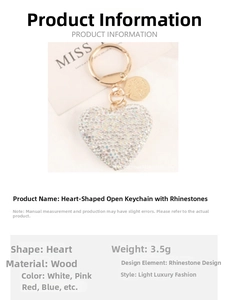 Detailed view of glittering heart keychain with rhinestones and golden key ring