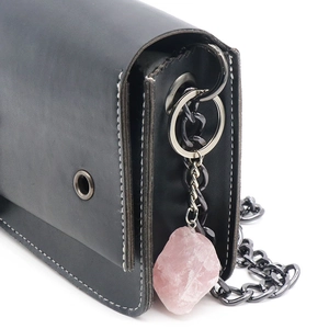 Natural crystal stone keychain with pink gemstone pendant on black leather and metal chain