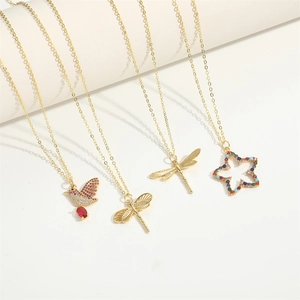 Golden necklaces featuring dragonfly, hummingbird and five-pointed star pendants