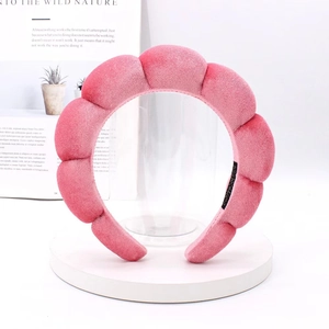 Pink velvet padded headband with twisted cloud design and soft sponge filling for women
