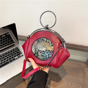 Ethnic style red evening shell bag with elephant relief and metal ring handle