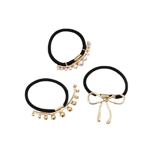 Three elegant black hair ties featuring pearl, golden bead, and bowknot decorations