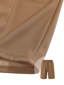 Macro view of tan breathable honeycomb knit fabric for men's athletic shorts set