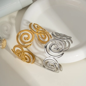 Minimalist spiral twisted open cuff bracelet in polished gold and silver stainless steel
