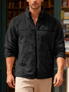 Detail of men's fleece jacket showing standing collar and front zipper in dark black