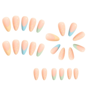 Detailed flat lay of long French press-on nails with colorful tips and floral accents