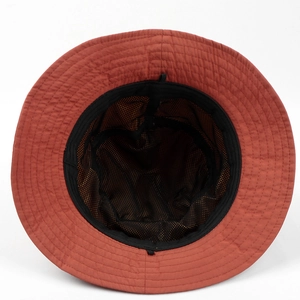 Detail of breathable mesh lining and adjustable drawstring on a quick-dry sun hat