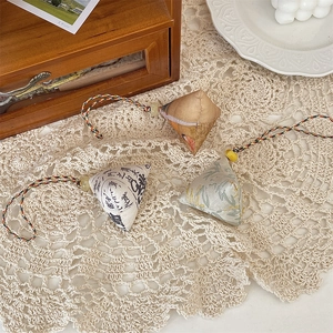 Three traditional Zongzi-shaped fabric charms in silk-like fabric with braided cords