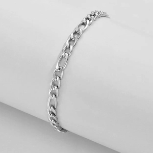 Silver Figaro chain bracelet for men with heavy metal texture on a white display stand