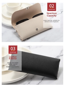 Detail of beige and black leather sunglass cases with metal snaps on marble surface