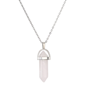 Macro shot of hexagonal pink crystal pillar pendant with silver metal bail and chain