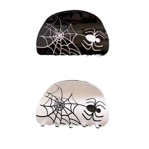 Halloween acetate spider hair claw clips in black and white with web design patterns