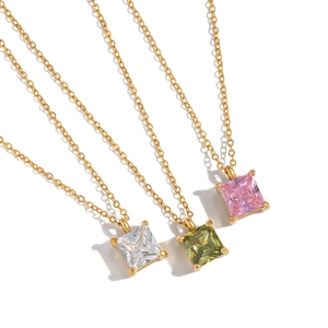 Titanium steel square zircon pendants in gold finish on white background