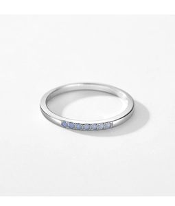 Close-up of S925 sterling silver thin ring with light blue opal stones inlay