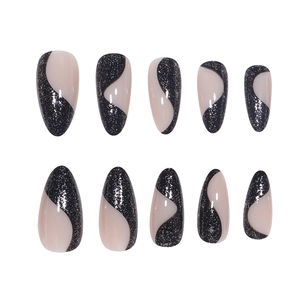 Minimalist almond black and white glitter swirl press-on nails set on white background