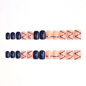 Short square press-on nails with dark blue and coral pink galaxy design and rhinestones