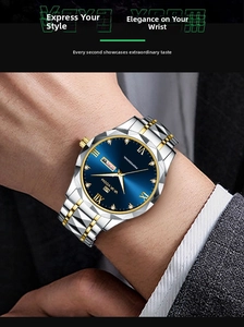 Detail of men's stainless steel watch with blue sunray dial and day-date display