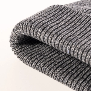Winter rib-knit wool beanie in dark grey with thick texture and foldable cuff design