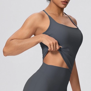 Macro view showing the seamless stitching and high-stretch fabric of the dark grey yoga set