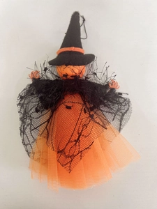 Detailed close-up of a Halloween witch doll pendant with black mesh and orange felt hat