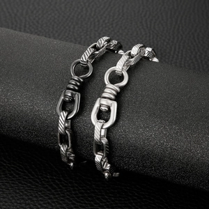 Industrial style stainless steel link bracelet with knurled texture in black and silver
