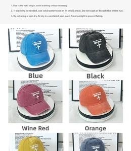 Multiple colors of washed cotton baseball caps with GOD WINS print and cross logo