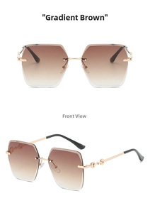 Macro shot of gradient tea lenses and golden metal temples with chain link detail