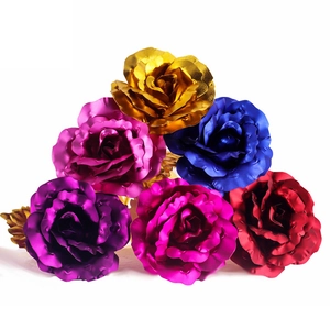 Detailed cluster of colorful metallic foil roses in gold, blue, red, and purple hues