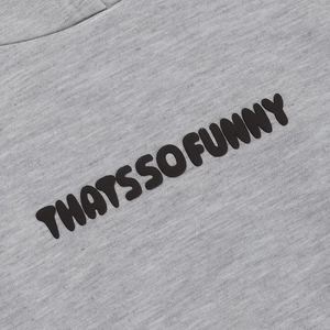Detail of high-quality 3D foam puff print lettering on grey cotton hoodie fabric