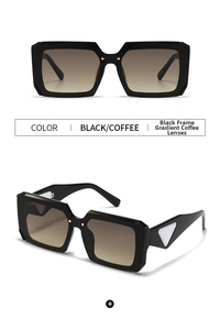 Detail view of square oversized sunglasses with white triangle design on temple