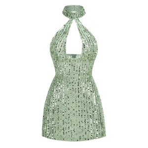 Detailed view of mint green sequins and mesh fabric on a halter neck mini dress