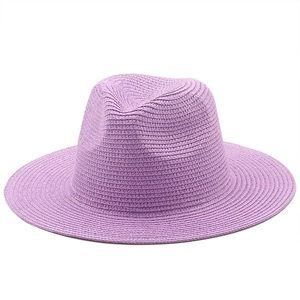 Detail of light purple woven wide-brim sun hat with classic indented crown design