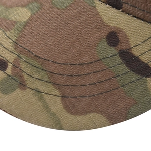 Detail of ripstop camouflage fabric and four-row reinforced stitching on the cap brim