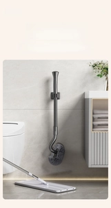 Space-saving wall-mounted S-shaped toilet brush with long handle and curved brush head