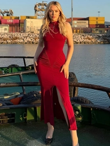 Red halter neck maxi dress with ruched waist and side slit in a slim fit silhouette