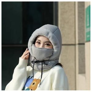 Detail of gray thermal trapper hat with windproof fabric and soft plush lining