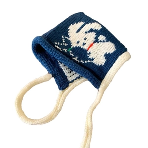 Dark blue knitted baby balaclava with white rabbit jacquard and adjustable ties