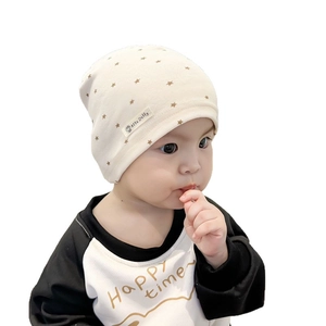 Soft beige star-print knitted cotton baby beanie for infants and toddlers in spring