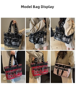 Detail view of gothic rivet tote bag in plaid patterns with multiple functional pockets