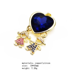 Detail of copper gold-plated necklace with blue heart zircon and small boy girl charms