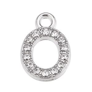 Detailed view of silver letter O pendant with sparkling crystal inlay for DIY jewelry