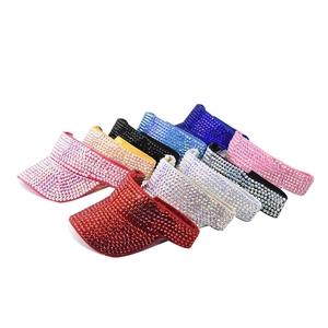 Detail showing various colors of rhinestone-studded sun visors in high sparkle finish
