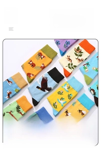 Flat lay of colorful cotton crew socks with animal jacquard and floral plant patterns