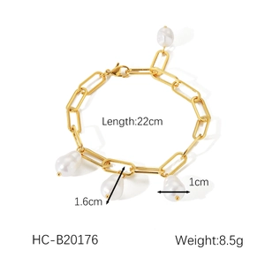 Detail of 18K gold stainless steel chain bracelet with four baroque pearl charms