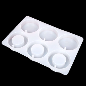 Detail view of 6-cavity round silicone mold for handmade soap and epoxy resin casting