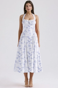 Detail of the halter neck tie and blue floral print on the slim fit summer maxi dress